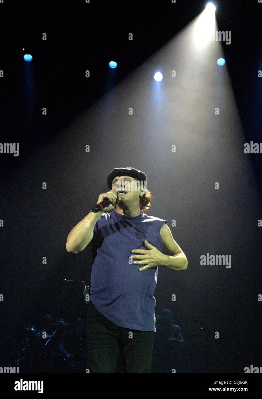 Australian heavymetal band AC/DC's lead singer Brian Johnson performs live in concert at the Carling Hammersmith Apollo in west London. Stock Photo