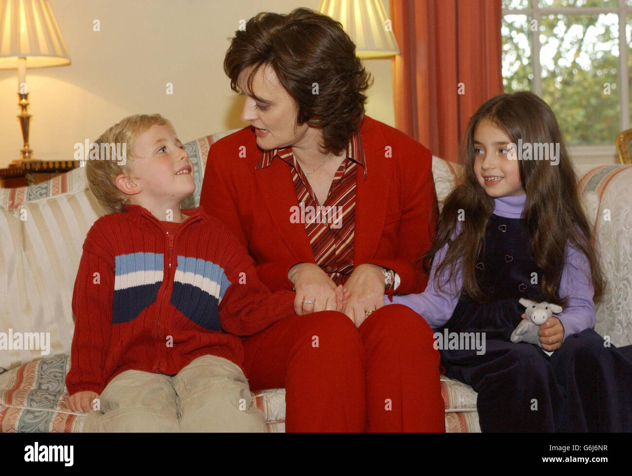 Cherie Blair, wife of Britiains Prime Minister Tony Blair, with five-year-old Max Shotbolt (left), from London and six-year-old Asha Matthan-Rogers, from Lincoln at 10 Downing Street, London, where the Prime Minister's wife hosted the launch of a 10 year, Government backed Family Friendly Campaign which aims to make Britain a better place to bring up children. Stock Photo