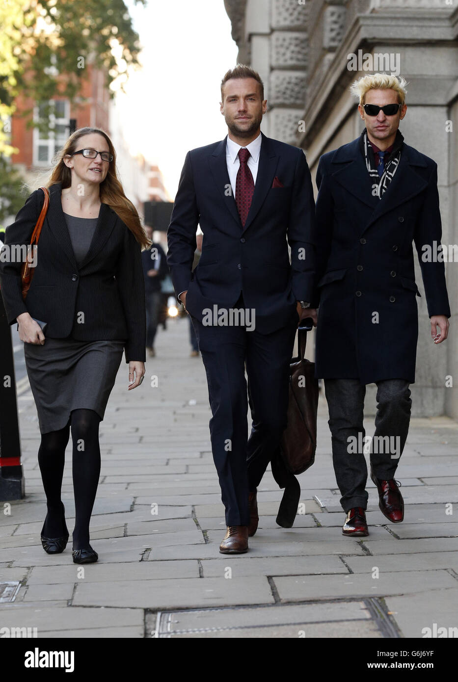 Calum Best (centre) arrives at the Old Bailey as the phone hacking trial continues. Stock Photo