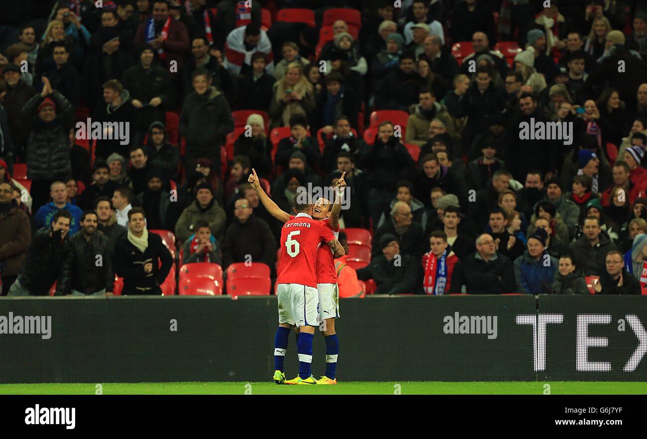 Soccer - International Friendly - England v Chile - Wembley Stadium. Chile's Sanchez Alexis celebrates scoring his side's second goal Stock Photo