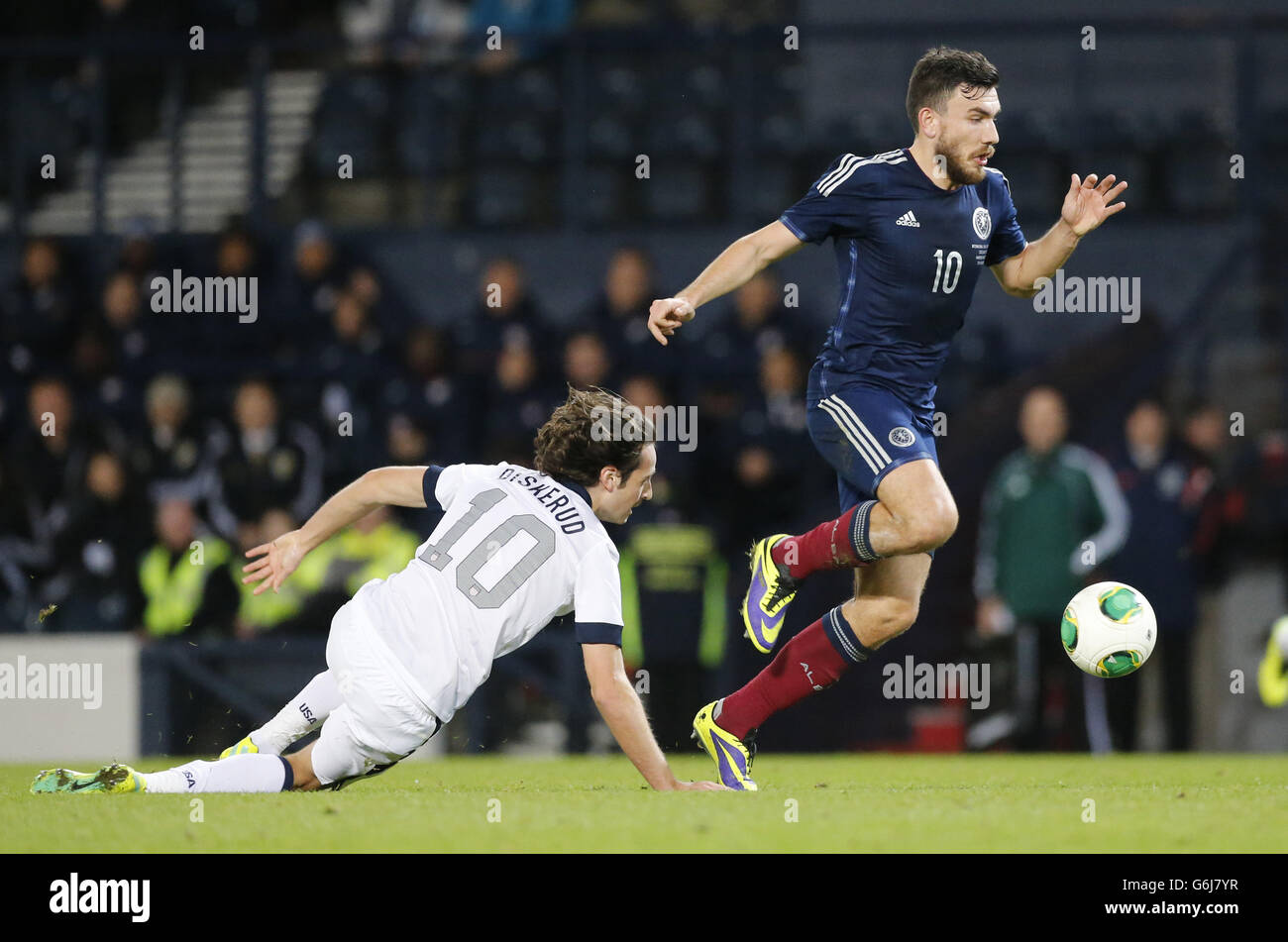 Scotland's Robert Snodgrass and USA's Mix Diskerud battle for the ball during the International Friendly at Hampden Park, Glasgow. Stock Photo