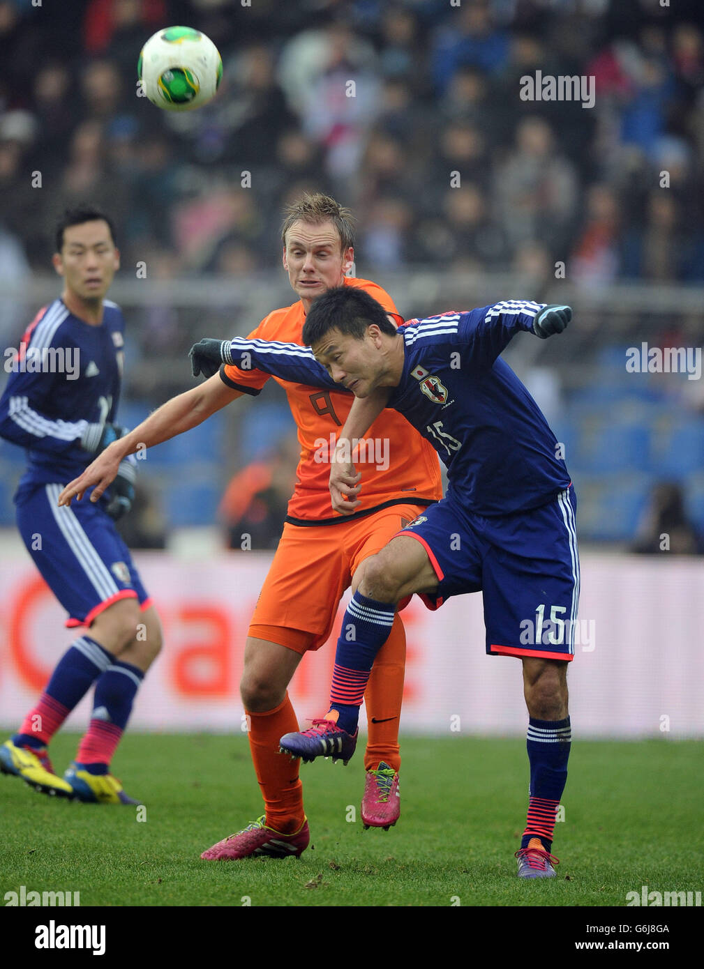 Japan's Yasuyuki Konno (right) and Netherlands' Siem De Jong (left) battle for the ball Stock Photo