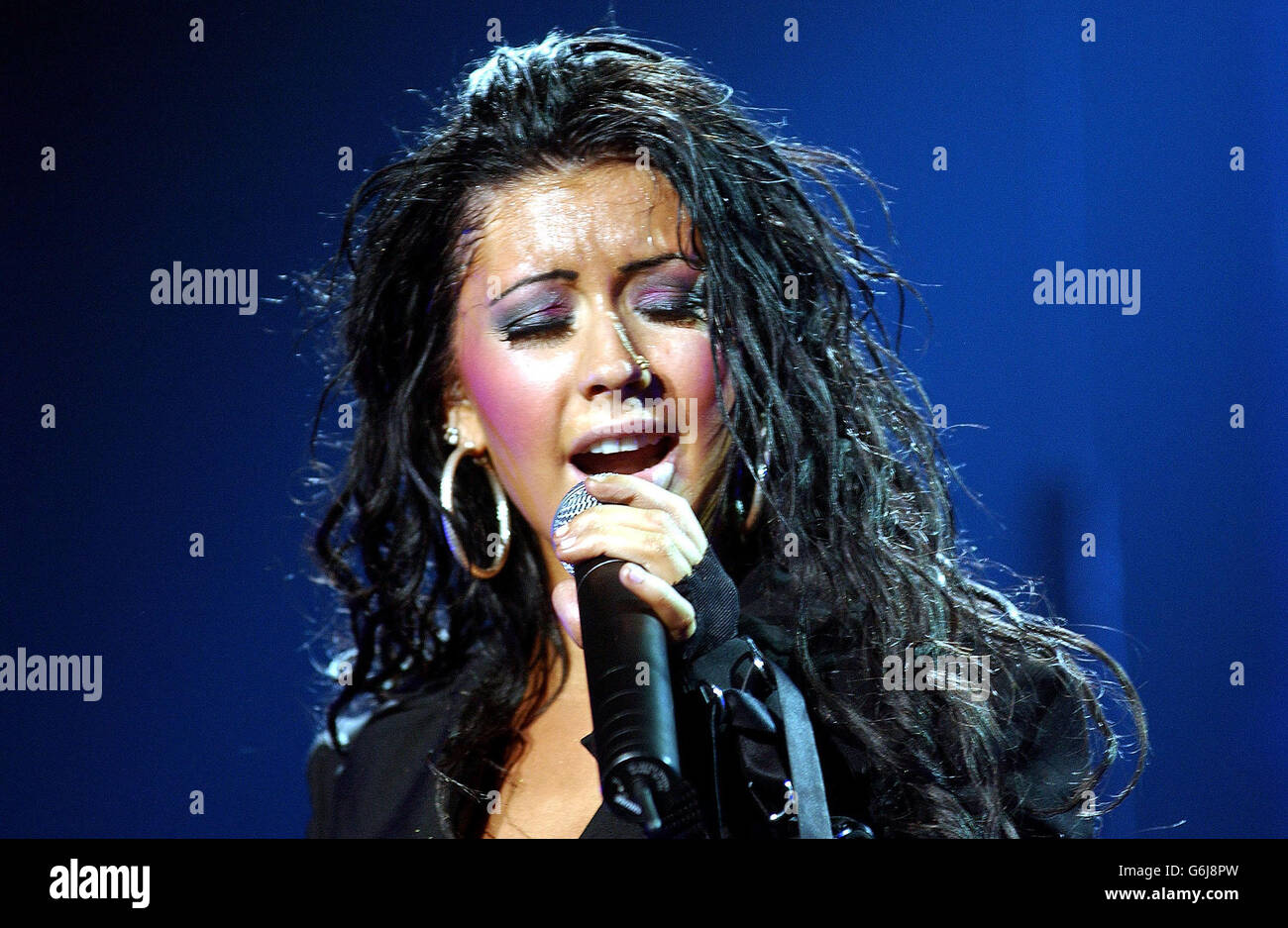 American singer Christina Aguilera on stage during her concert, at the NEC Arena in Birmingham. Stock Photo