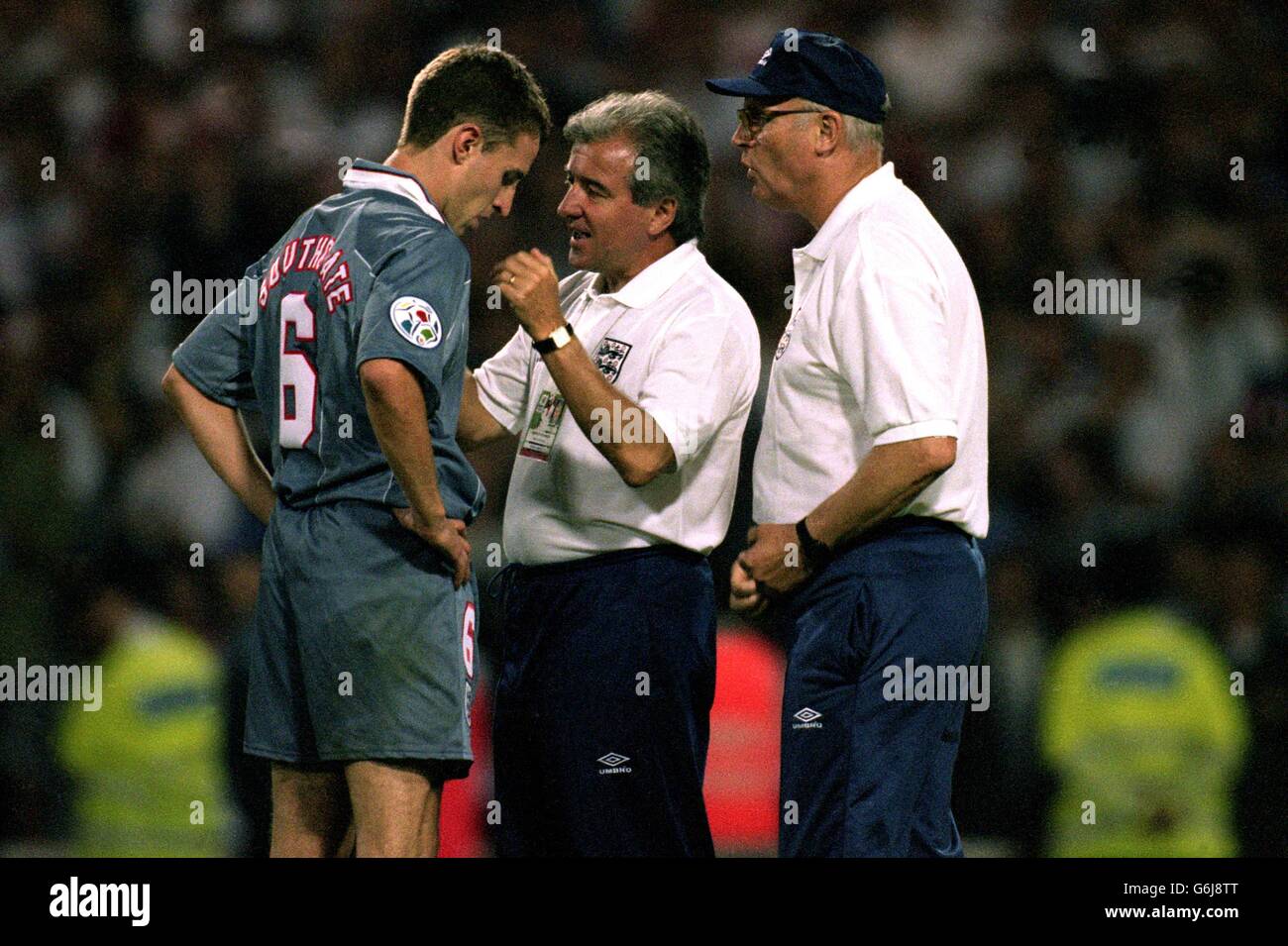 Soccer - Euro 96 - Semi Final - England v Germany. England Manager Terry Venables and Don Howe console Gareth Southgate after his penalty miss Stock Photo