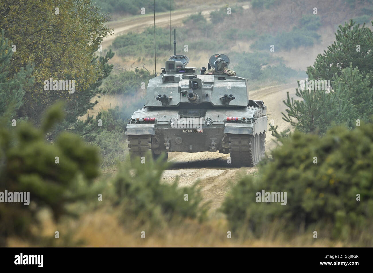 A Challenger 2 Main Battle Tank manned by reservist soldiers from the Royal Wessex Yeomanry (RWxY), the South West???s Army Reserve Cavalry Regiment, pictured while on a live firing exercise at Five Tips Range near Lulworth in Dorset. Stock Photo