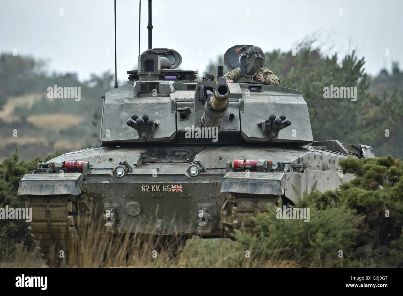 A Challenger 2 Main Battle Tank manned by reservist soldiers from the Royal Wessex Yeomanry (RWxY), the South West???s Army Reserve Cavalry Regiment, pictured while on a live firing exercise at Five Tips Range near Lulworth in Dorset. Stock Photo