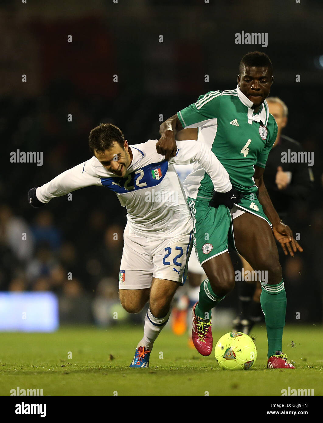 Italy's Giuseppe Rossi (left) and Nigeria's John Ogu during the International Friendly at Craven Cottage, London. Stock Photo