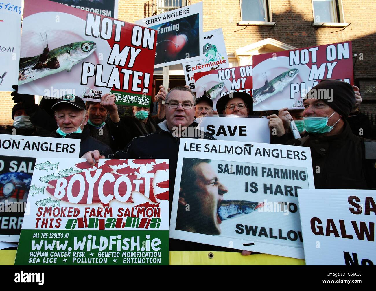 Protesters at the launch of 'Boycott Farmed Salmon For Christmas' outside the Shelbourne Hotel, Dublin, where the Good Food Ireland Conference is taking place. Stock Photo