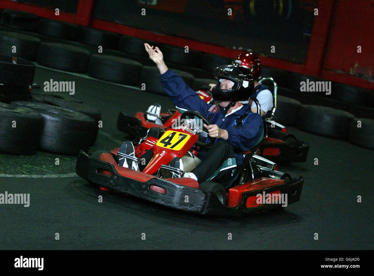 Ireland's Ronan O'Gara leads his team mates into a corner whilst they enjoy some indoor karting, on a day-off in Melbourne ahead of this weekend's Rugby World Cup Quarter-final. Stock Photo