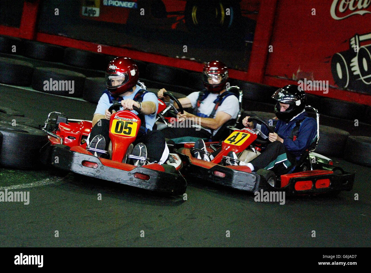 Ireland's Marcus Horan (05) leads Ronan O'Gara (47) into a corner whilst they enjoy some indoor karting, on a day-off in Melbourne ahead of this weekend's Rugby World Cup Quarter Final clash with France. NO MOBILE PHONE USE. INTERNET SITES MAY ONLY USE ONE IMAGE EVERY FIVE MINUTES DURING THE MATCH. Stock Photo