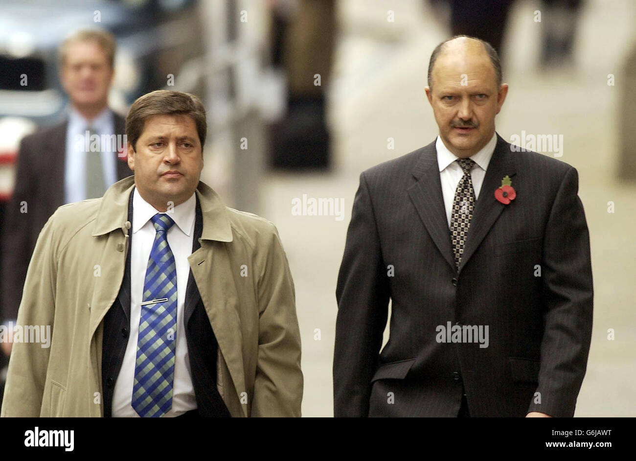 Detective Chief Inspector Andy Hebb (left) and Temporary Detective Chief Superintendent Chris Stevenson (right) arrive at the Old Bailey, central London, for the start of the Soham murder trial. The pair headed the Police investigation into the murder of the Soham school girls Holly Wells and Jessica Chapman. Stock Photo