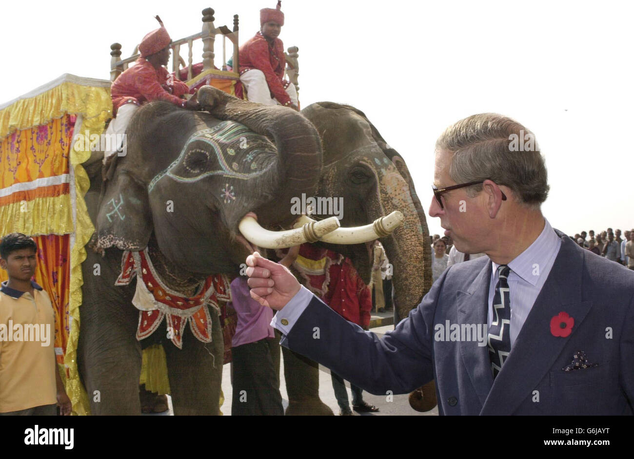 Prince Charles meets two elephants Stock Photo