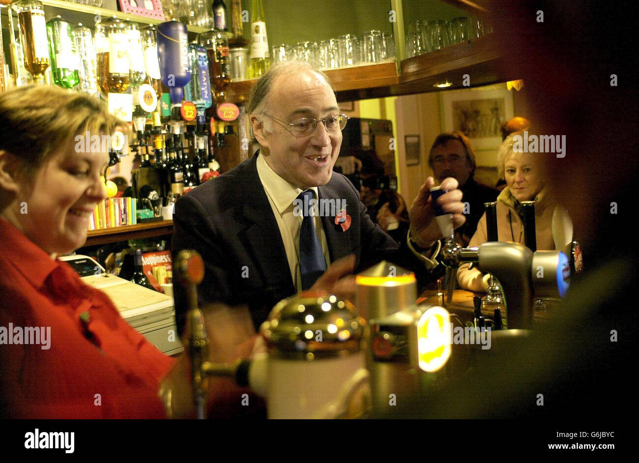 New Conservative Party leader Michael Howard pulls a pint from behind the bar at the Kings Head in Hythe. Mr Howard was this weekend putting the finishing touches to his shadow cabinet following his unopposed election on Thursday. Stock Photo