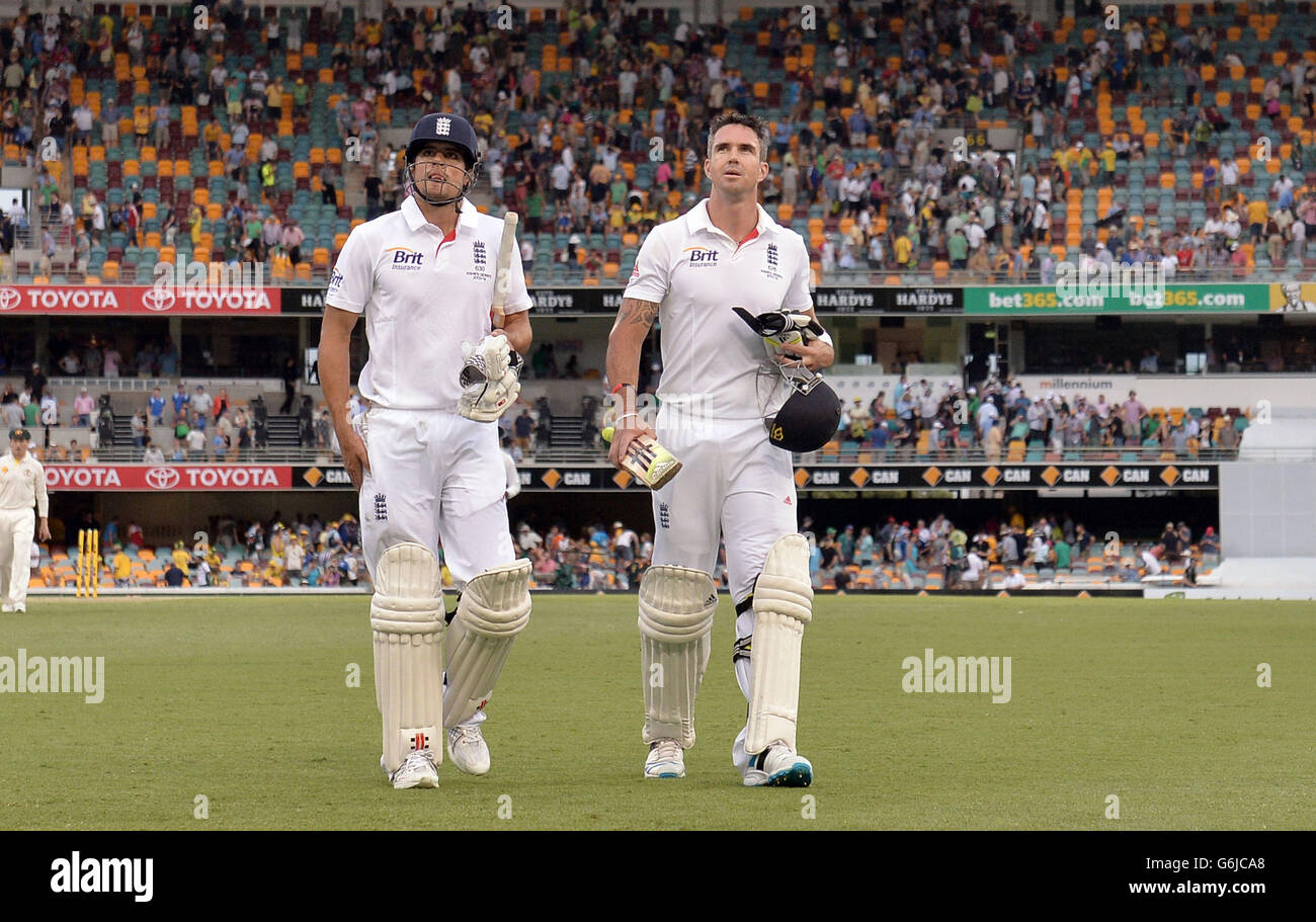 England S Alastair Cook Left And Kevin Pietersen Right Look On As The Players Leave The Field At The Close Of Play During Day Three Of The First Ashes Test At The Gabba Brisbane