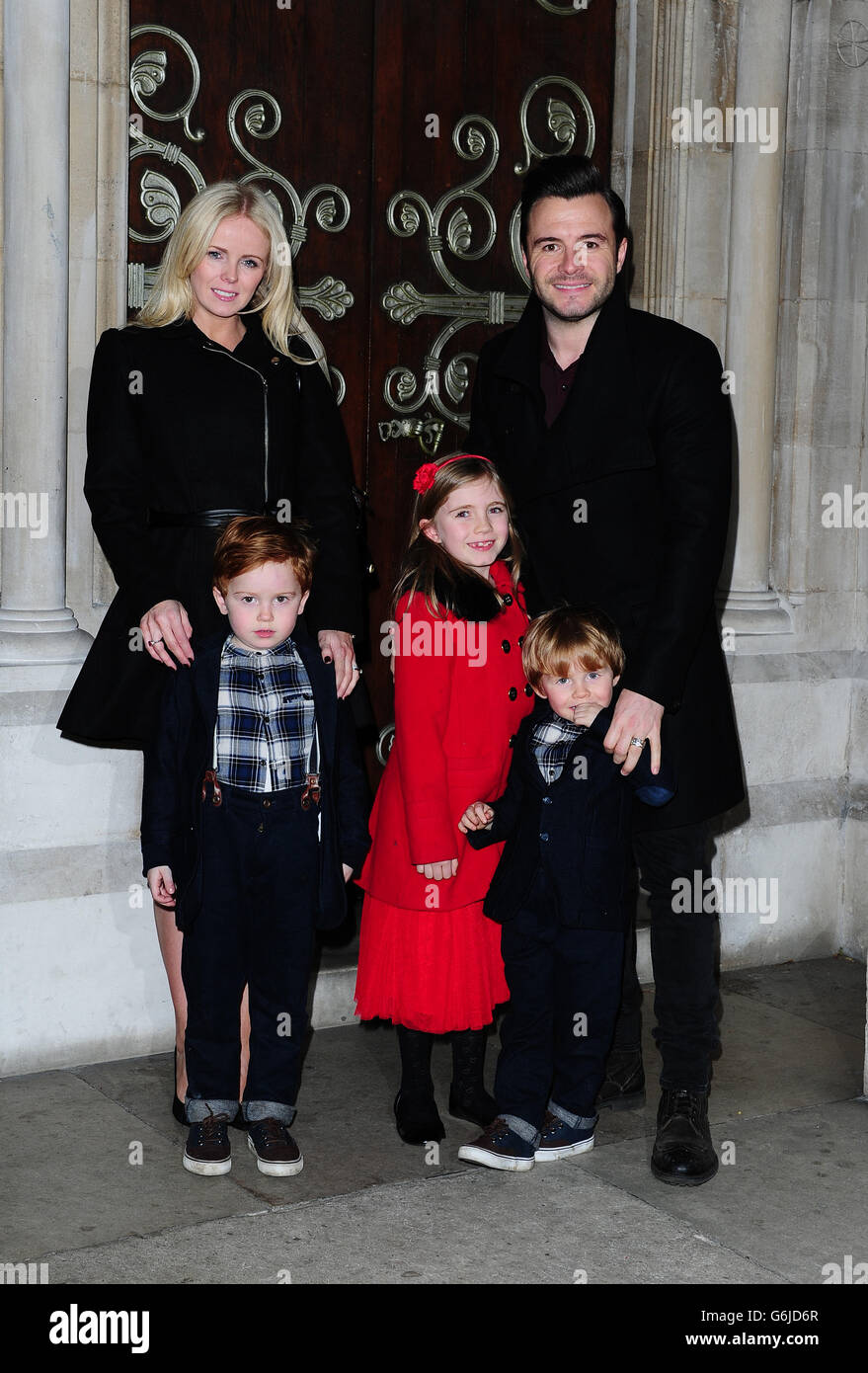 Shane Filan and his family attend the Decca Christmas Carol Concert, in aid of Great Ormond Street Hospital, held at St. James Roman Catholic Church in London. Stock Photo