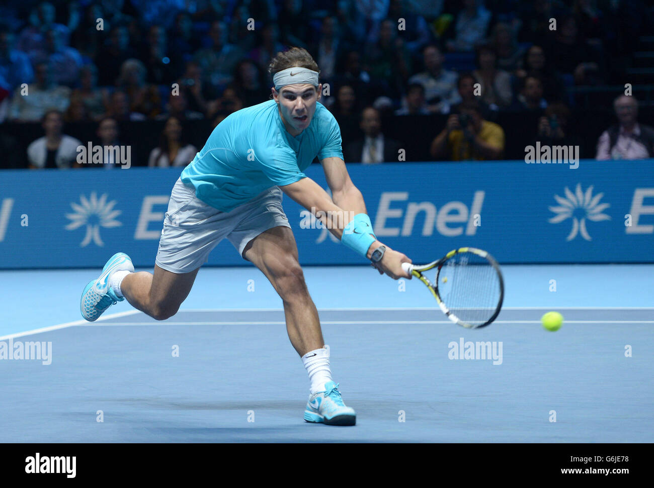 Spain's Rafael Nadal stretches for a ball during his match against Serbia's Novak Djokovic during day eight of the Barclays ATP World Tour Finals at the O2 Arena, London. PRESS ASSOCIATION Photo. Picture date: Monday November 11, 2013. See PA story TENNIS London. Photo credit should read: Adam Davy/PA Wire Stock Photo