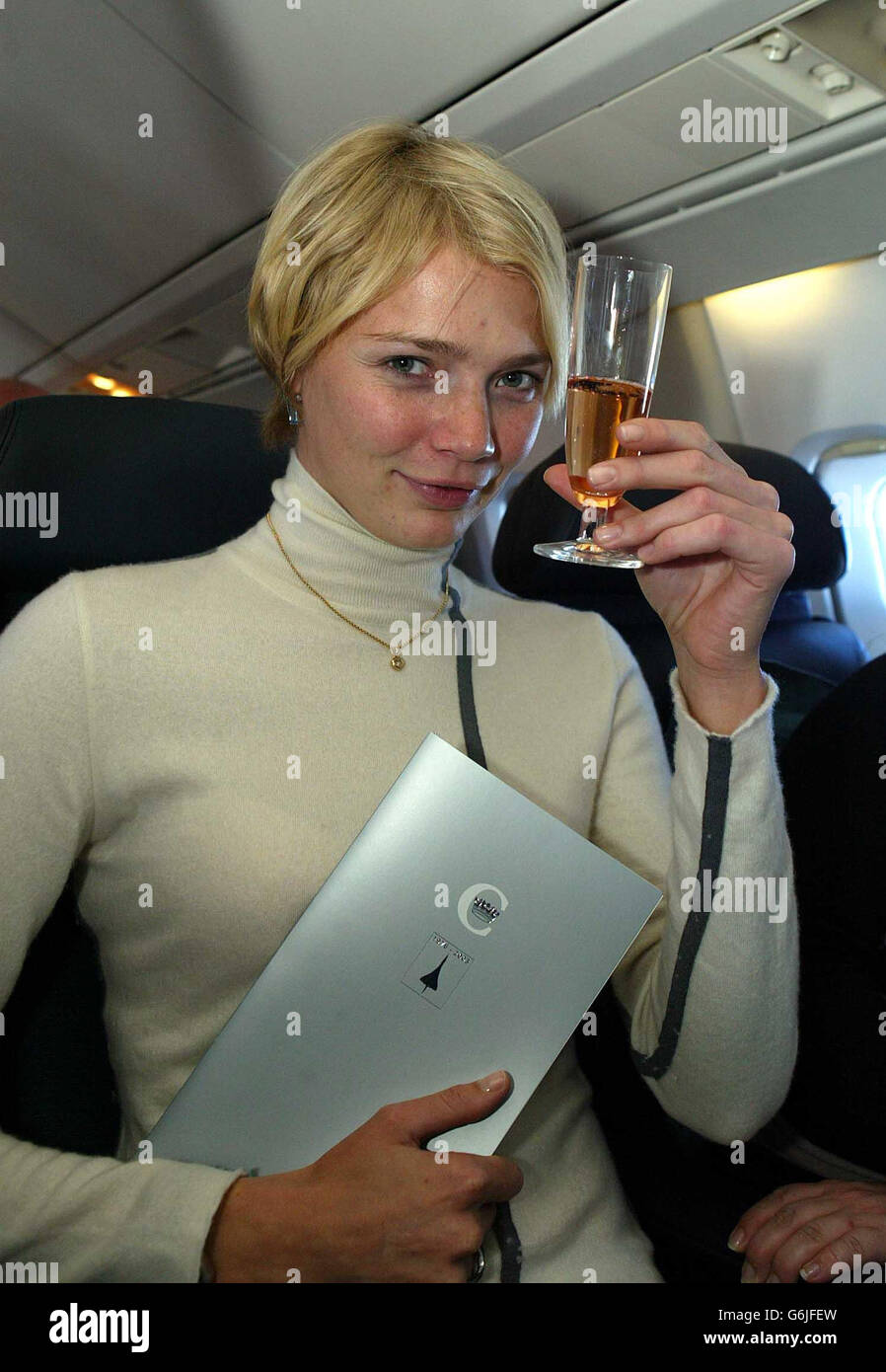 British model Jodie Kidd on the last commercial flight of Concorde from JFK to Heathrow, on the day that the world's first supersonic airliner retired from commercial service. Stock Photo