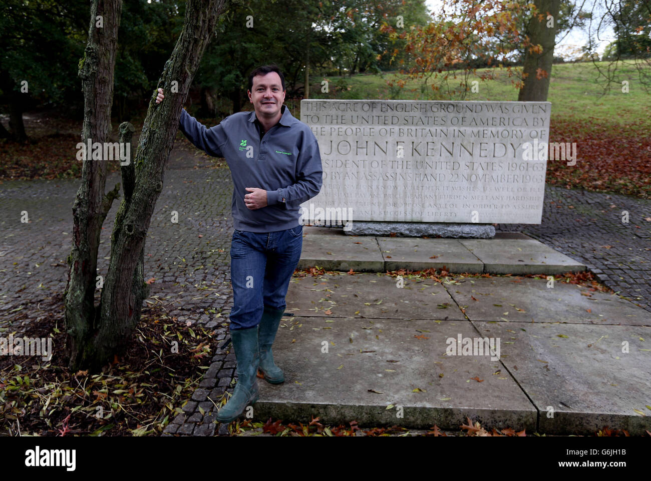 Geri Silverstone, National Trust spokesman stands next to the memorial for former US President John Kennedy in Runnymede near Egham, Surrey. As the world marks the 50th anniversary of the death of JFK, Britain's commemorations will centre on a simple wreath-laying ceremony at the UK memorial dedicated to the president. Stock Photo