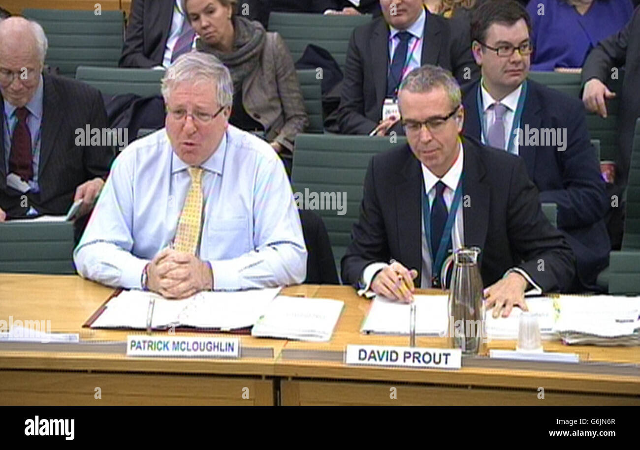 Transport Secretary Patrick McLoughlin and Director General of High Speed 2 David Prout answers questions in front of the Transport Select Committee at the House of Commons, central London on a contested report predicting the HS2 rail project could benefit the UK by &pound;15 billion a year. Stock Photo