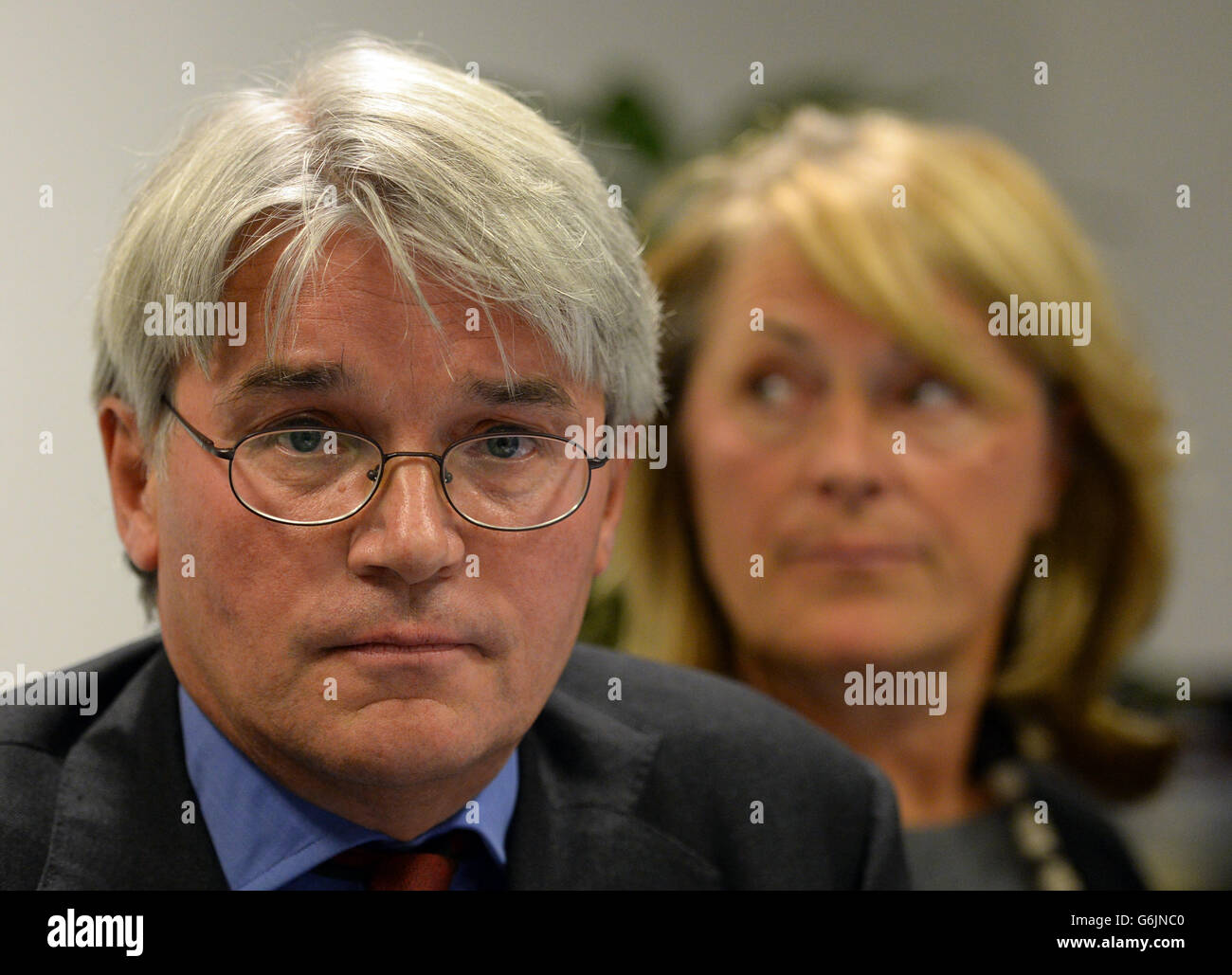 Andrew Mitchell and his wife Dr Sharon Bennett during a press conference in London, as he gives his reaction to the Crown Prosecution Service decision on the Plebgate row. Stock Photo