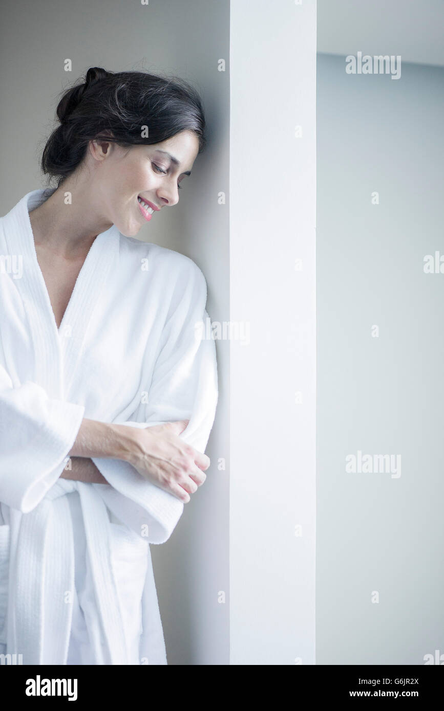 Woman relaxing in bathrobe Stock Photo