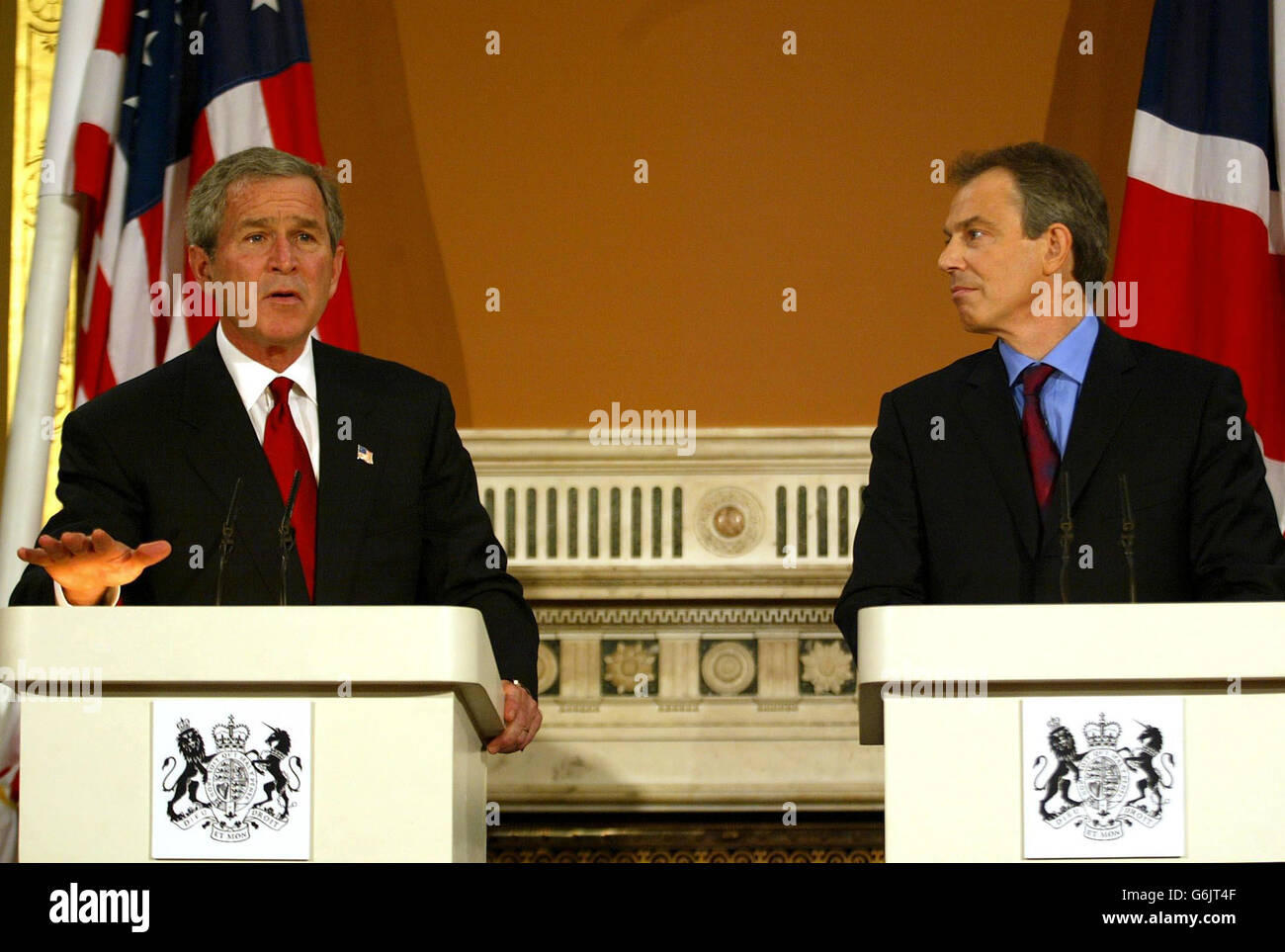 British Prime Minister Tony Blair (R) alongside US President George Bush speaking during a joint press conference at the Foreign Office in London. Mr Blair said the attacks of the British Consulate in Istanbul, demonstrated 'the evil these terrorists pose to innocent people everywhere'. President Bush added his condemnation of the Istanbul attacks, saying that it showed again that the terrorists 'hate freedom'. Stock Photo