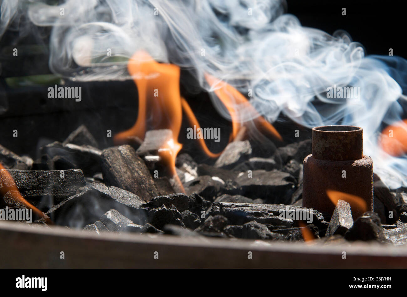 Burning charcoal in a barbecue Stock Photo Alamy