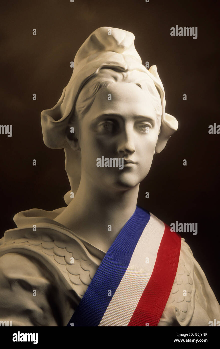 Statue of Marianne, national symbol of the French republic, with a sash in the French national colours Stock Photo