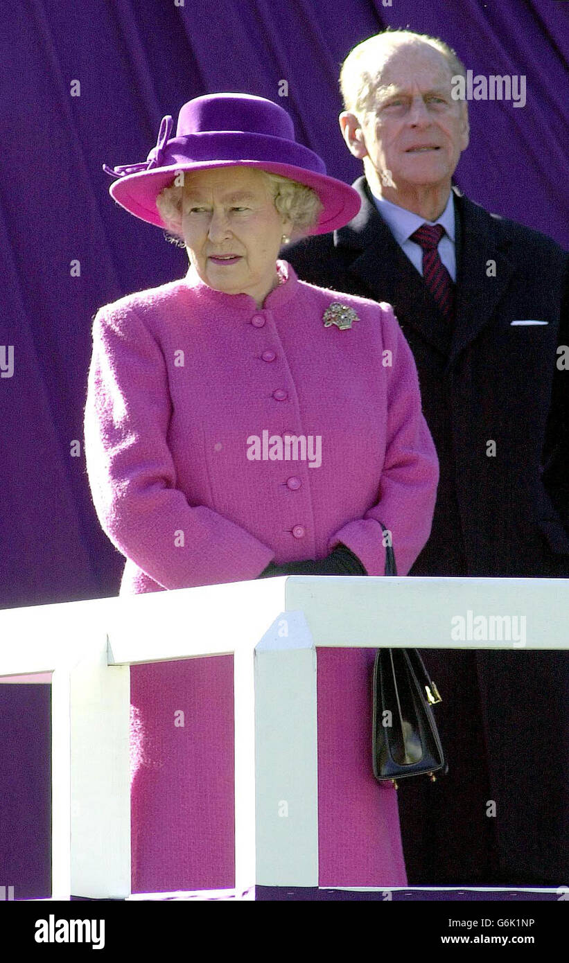 The Queen Elizabeth II accompanied by The Duke of Edinburgh before the unveiling of a bronze equestrian statue depicting Her Majesty on Horseback at the highest point on Queen Anne's ride, Windsor Great Park. The statue was made by sculptor Philip Jackson, and commissioned by the Crown Estate in honour of Her Majesty's Golden Jubilee. Stock Photo