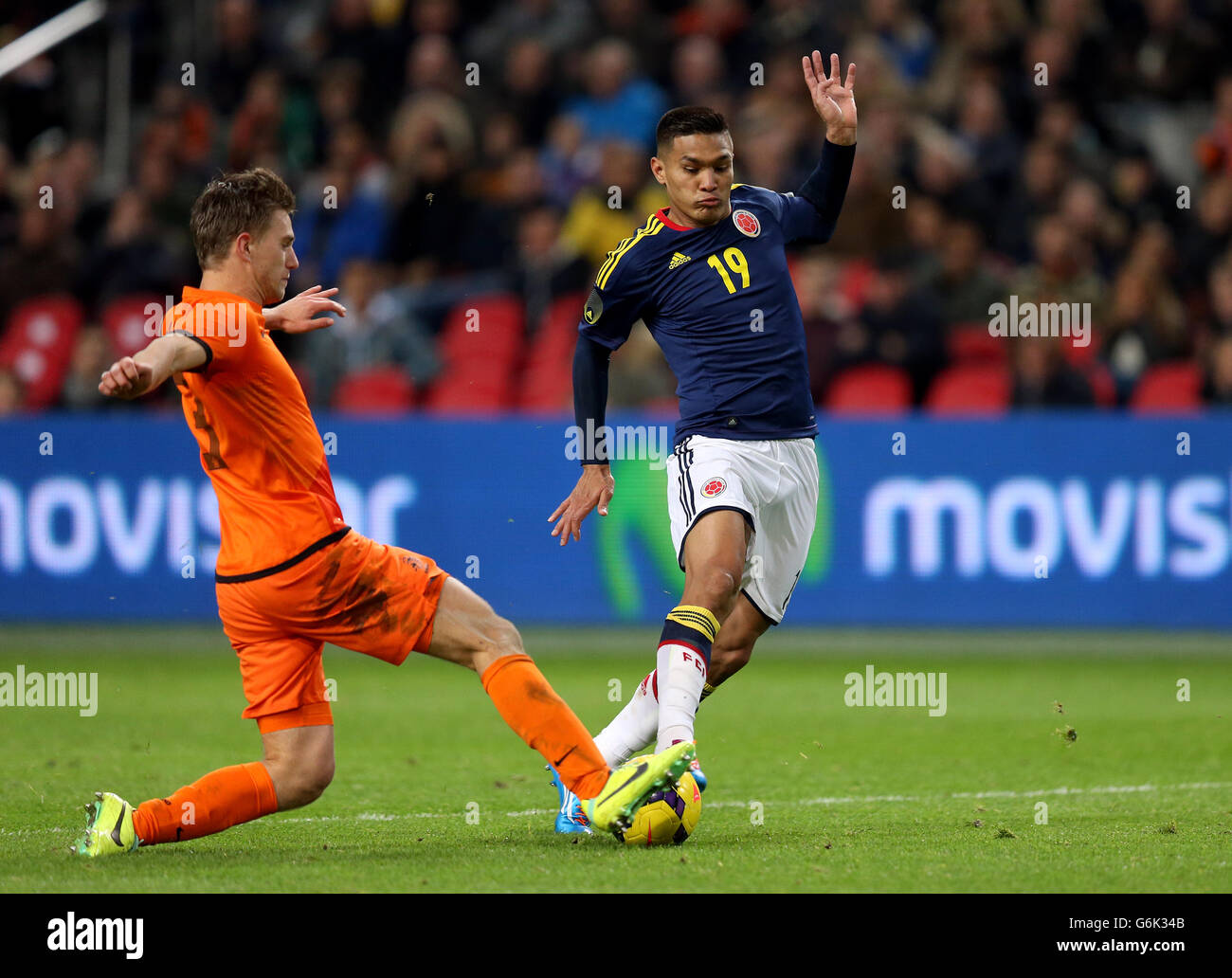 Soccer - International Friendly - Netherlands v Colombia - Amsterdam Arena. Netherlands' Joel Veltman and Colombia's Teofilo Gutierrez Stock Photo