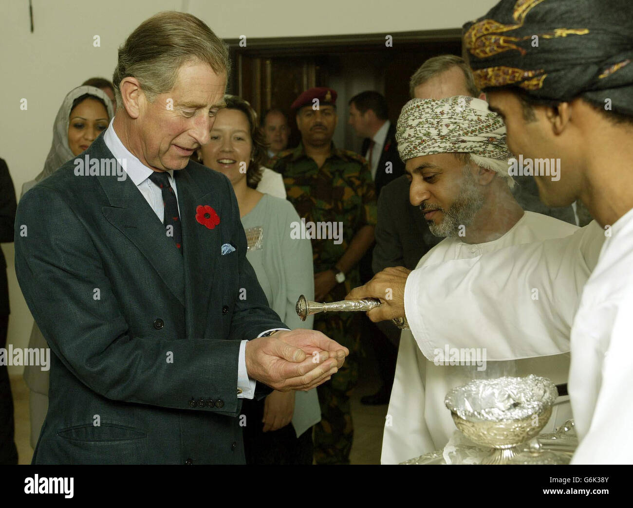The Prince of Wales is asked to wash his hands with rose-water in the traditional manner as he arrives at the Baital-Zubair Museum in Old Muscat, the Capital of the Oman in the middle East. The Prince arrived in the country from India yesterday, and will attend several engagements until he departs home Sunday lunchtime. Stock Photo