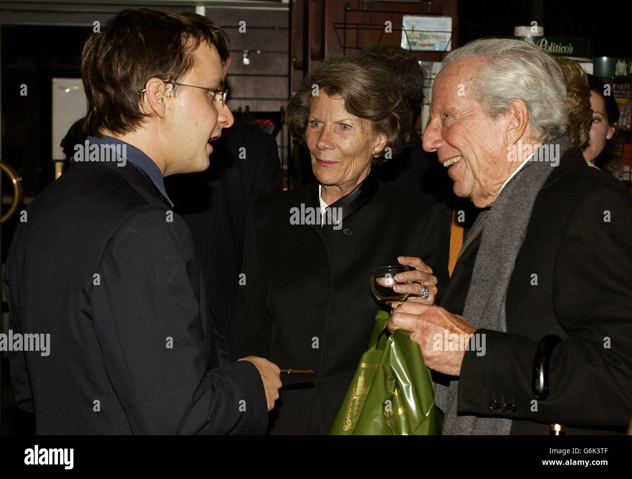Oliver Poole (left), Nicole Law and Frank Law at the book launch of Oliver Poole's 'Black Knights'. Stock Photo
