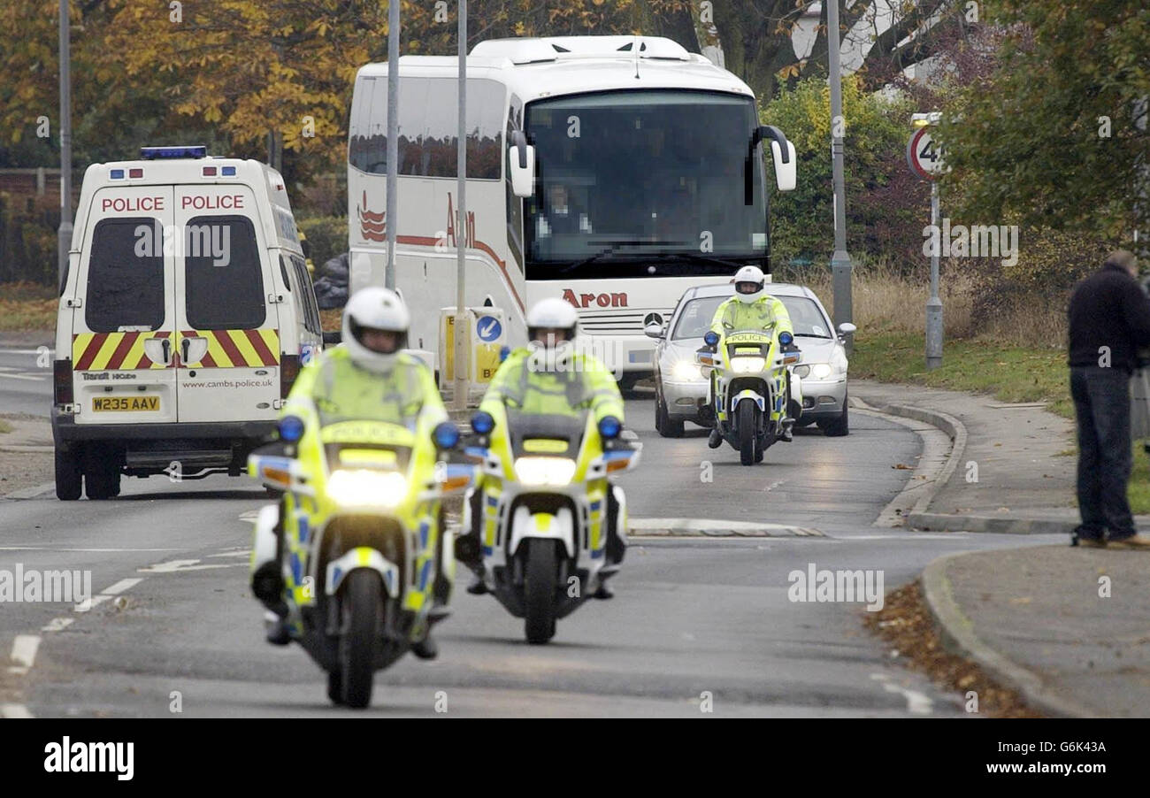 EDITORS PLEASE NOTE THE JURORS FACE MUST NOT BE MADE VISIBLE: The jury arrive by coach to the Cambridgeshire town of Soham where the jury in the trial of Ian Huntley and Maxine Carr will trace the last steps of Soham schoolgirls Holly Wells and Jessica Chapman. Stock Photo