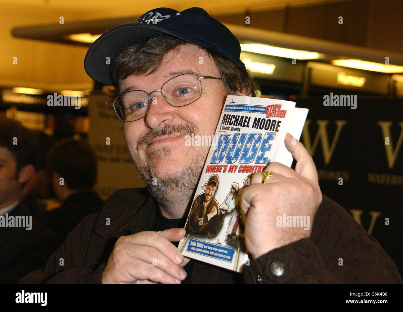 Author and documentary film-maker Michael Moore during a signing for his new book 'Dude, Where's My Country?' at Waterstones Piccadilly in central London. Stock Photo
