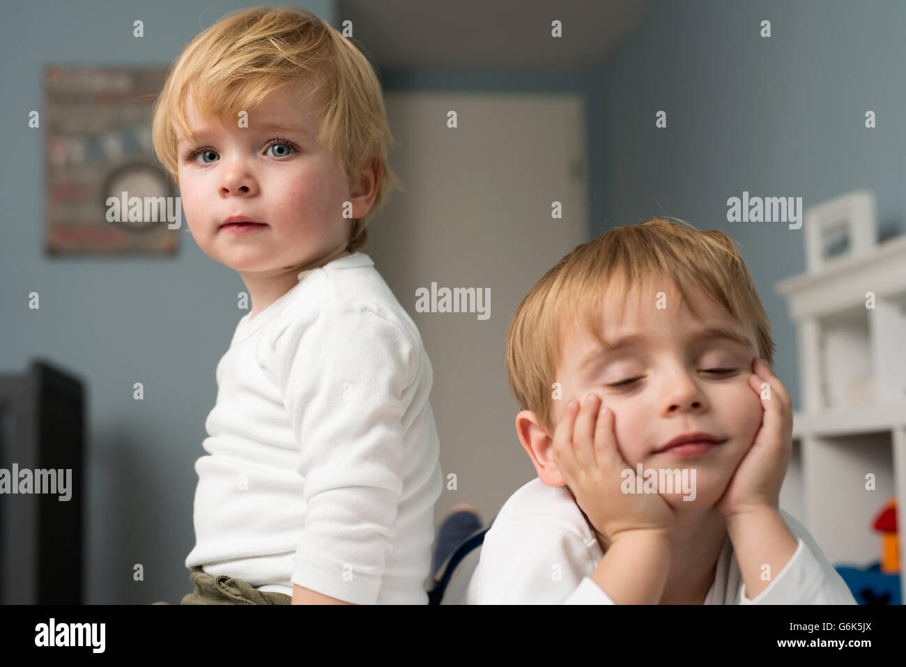 Two little boys playing at home Stock Photo - Alamy