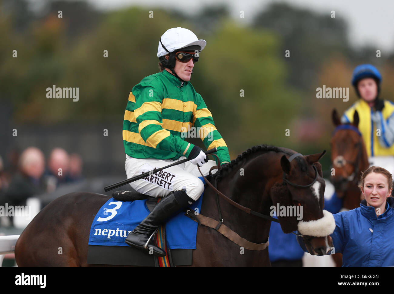 Jockey A.P. McCoy on Rum and Bitter before the Neptune Investment Management Novices' Hurdle during day one of The Showcase Meeting at Cheltenham Racecourse, Cheltenham Stock Photo