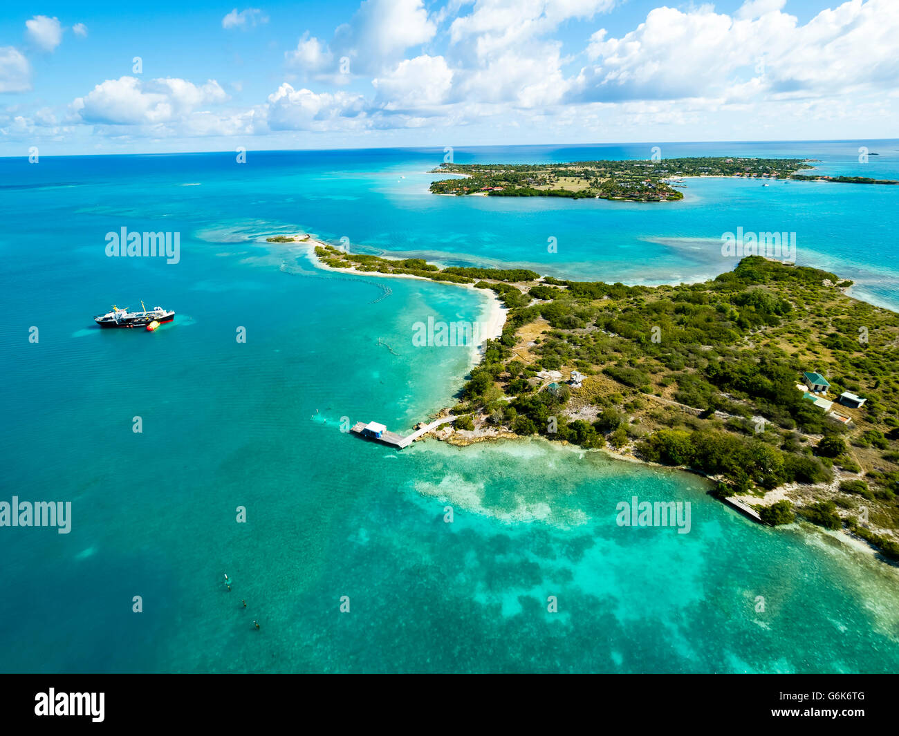 West Indies, Antigua and Barbuda, Antigua, Maiden Island, in the background Long Island Stock