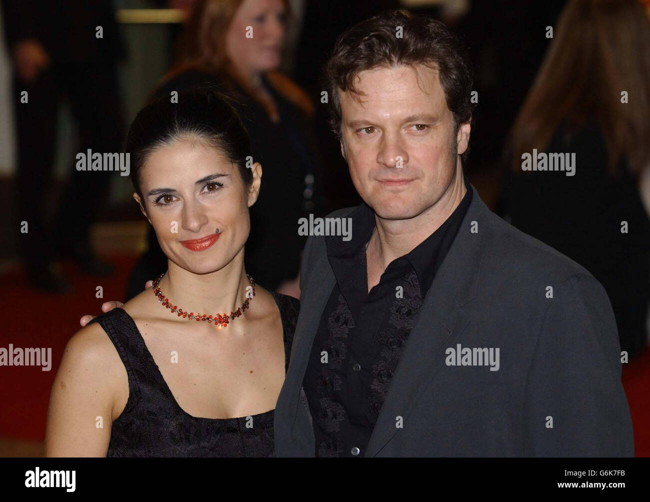 Actor Colin Firth and his wife Livia Guiggioli arrive for the UK Charity film Premiere of Love Actually,in aid of Comic Relief, held at the Odeon Leicester Square, central London. Stock Photo