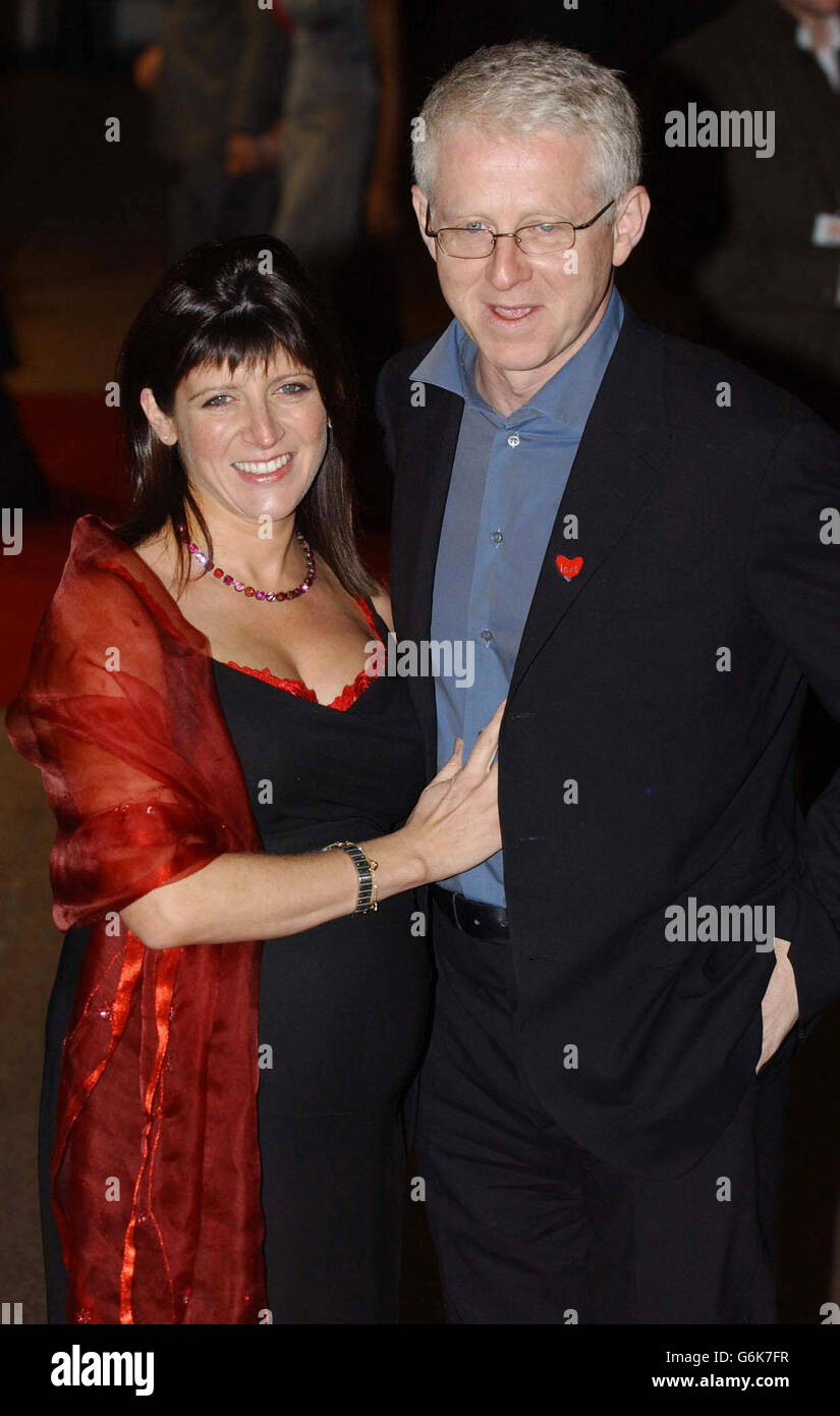 Writer and director Richard Curtis with his wife Emma Freud arrive for the UK Charity film Premiere of Love Actually, in aid of Comic Relief, held at the Odeon Leicester Square, central London. Stock Photo