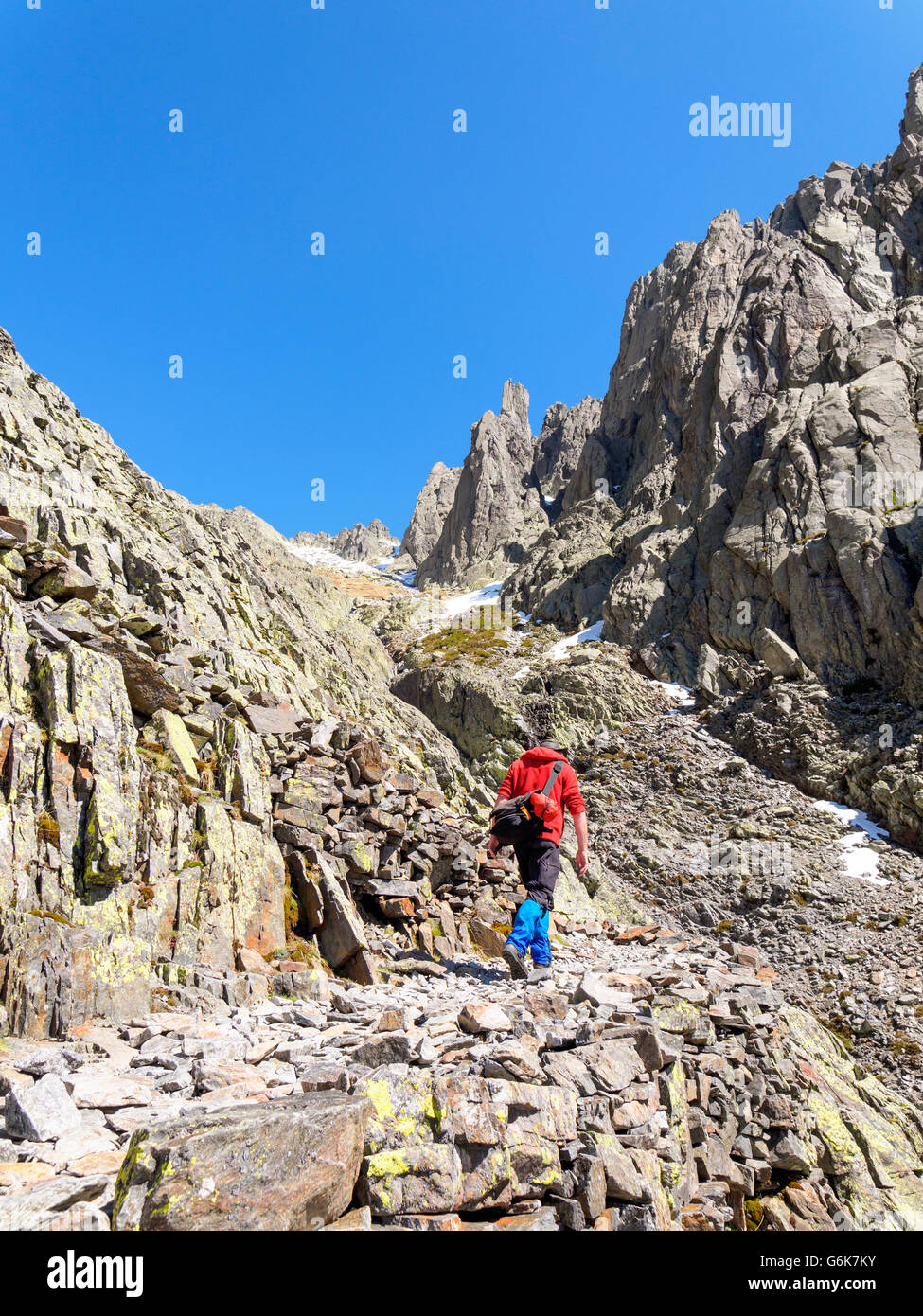 Spain, Sierra de Gredos, man hiking in mountains Stock Photo