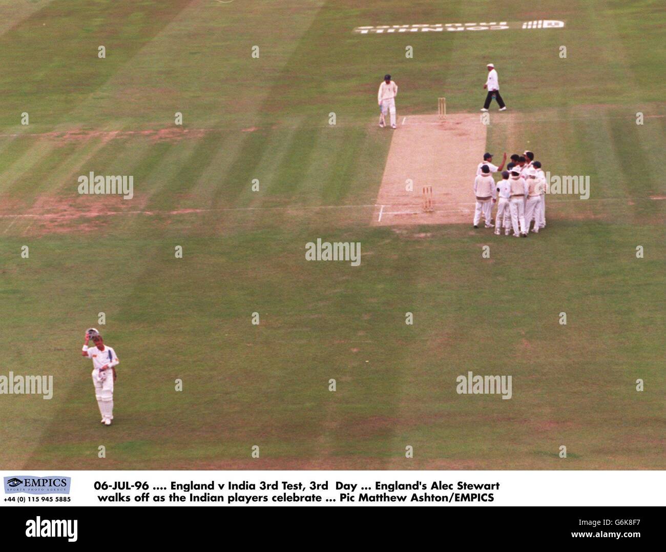 06-JUL-96. England v India 3rd Test, 3rd Day. England's Alec Stewart walks off as the Indian players celebrate Stock Photo