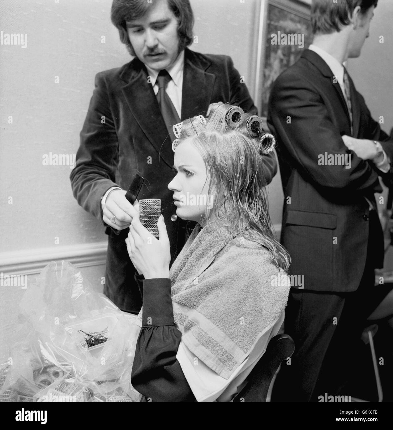 Crowned with rollers is Miss United Kingdom, Marilyn Ann Ward, 22, at a West End hairdressing salon where the Miss World contestants attended in preparation for the final. Stock Photo