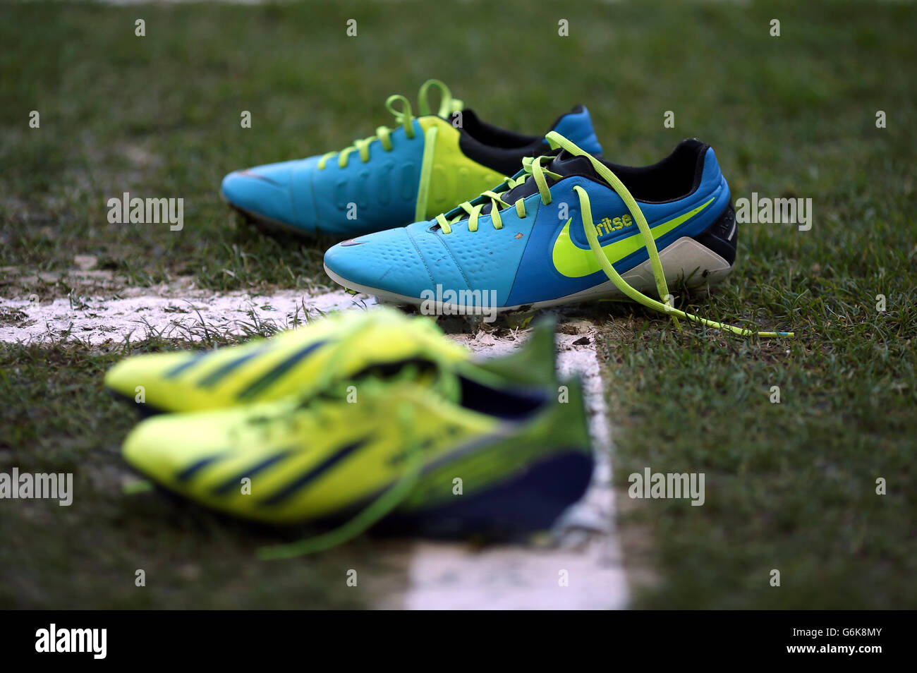 Adidas and nike football boots pitch side hi-res stock photography and  images - Alamy