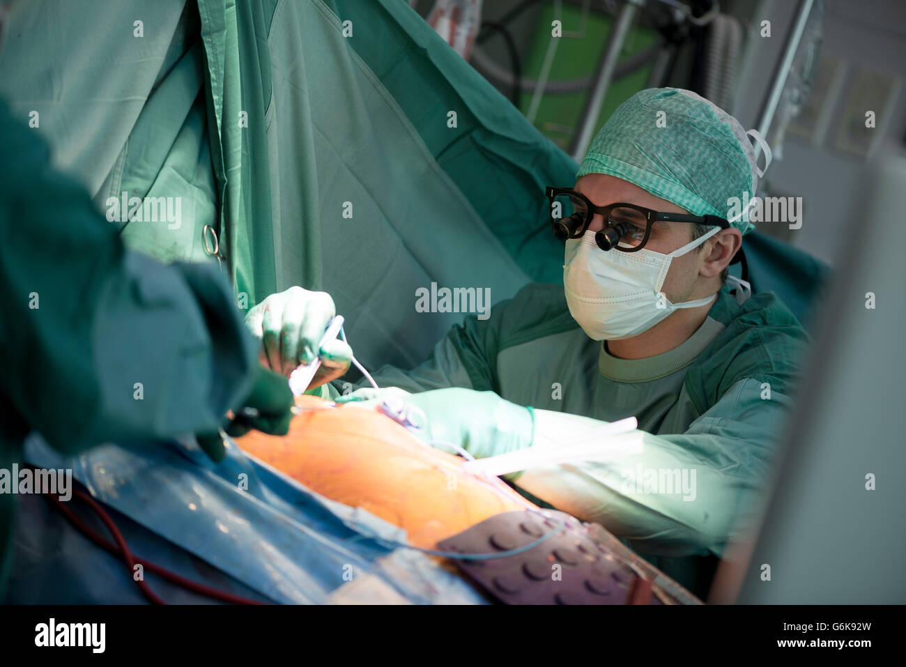 Heart surgeons during a heart operation Stock Photo - Alamy