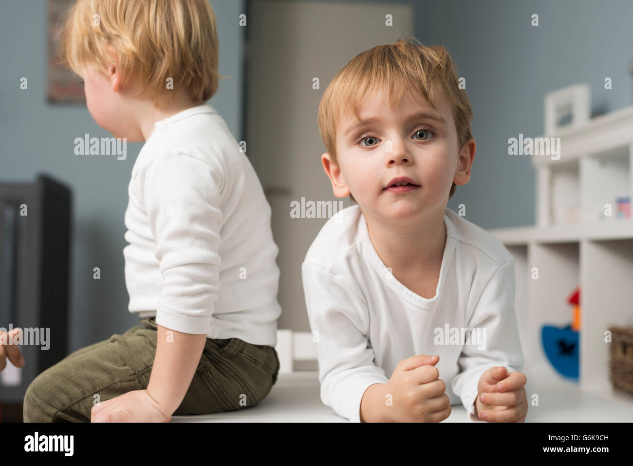 Two little boys playing at home Stock Photo - Alamy