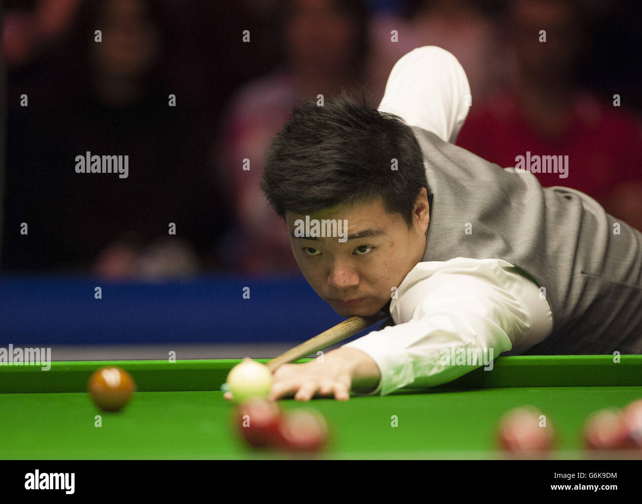 Ding Junhui in action against Ricky Walden during day nine of the williamhill.com UK Championships at The Barbican Centre, York. Stock Photo