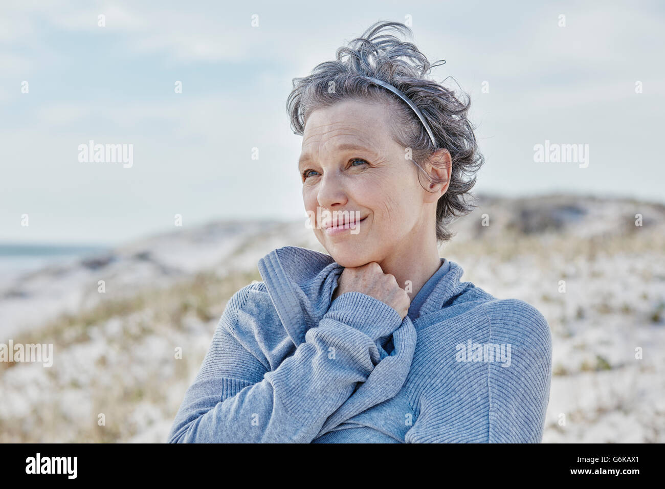 Outdoor portrait woman on beach hi-res stock photography and images - Alamy