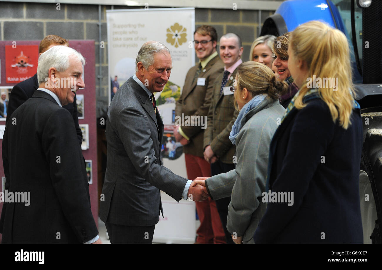 The Prince of Wales meets students of the Royal Agricultural University's RAG committee during a visit to the University's Rural Innovation Centre at Manor Farm in Gloucestershire. Stock Photo