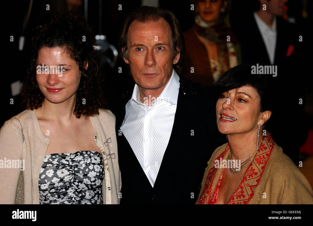 Actor Bill Nighy and his wife Diana Quick (right) arrive for the UK Charity film Premiere of Love Actually, in aid of Comic Relief, held at the Odeon Leicester Square, central London. Stock Photo