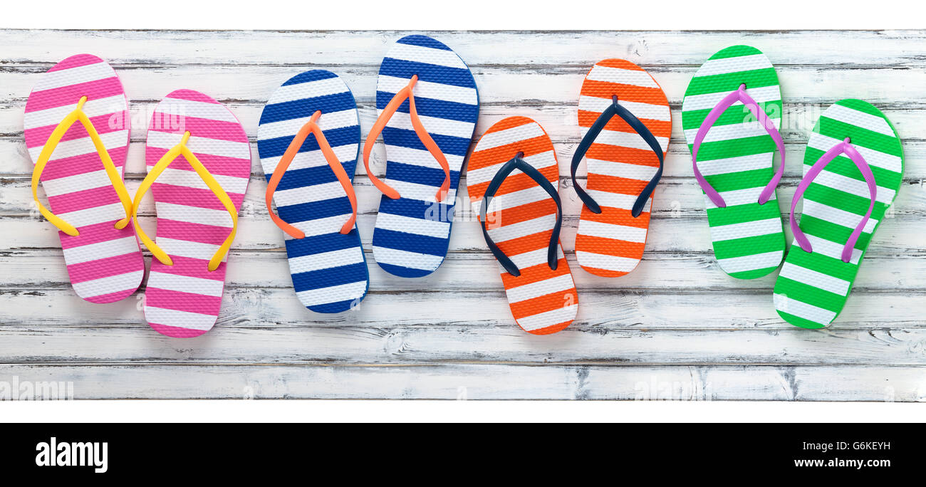 White wood with summer flip flops on it Stock Photo - Alamy